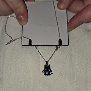 Elegant Silver Necklace with Purple Gemstone
